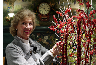 Elizabeth Windridge tends the Christmas decorations
