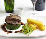 Roasted pigeon with fry polenta chips and elderberry sauce 